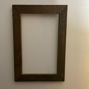 This frame is made of like barn wood look, really unique.